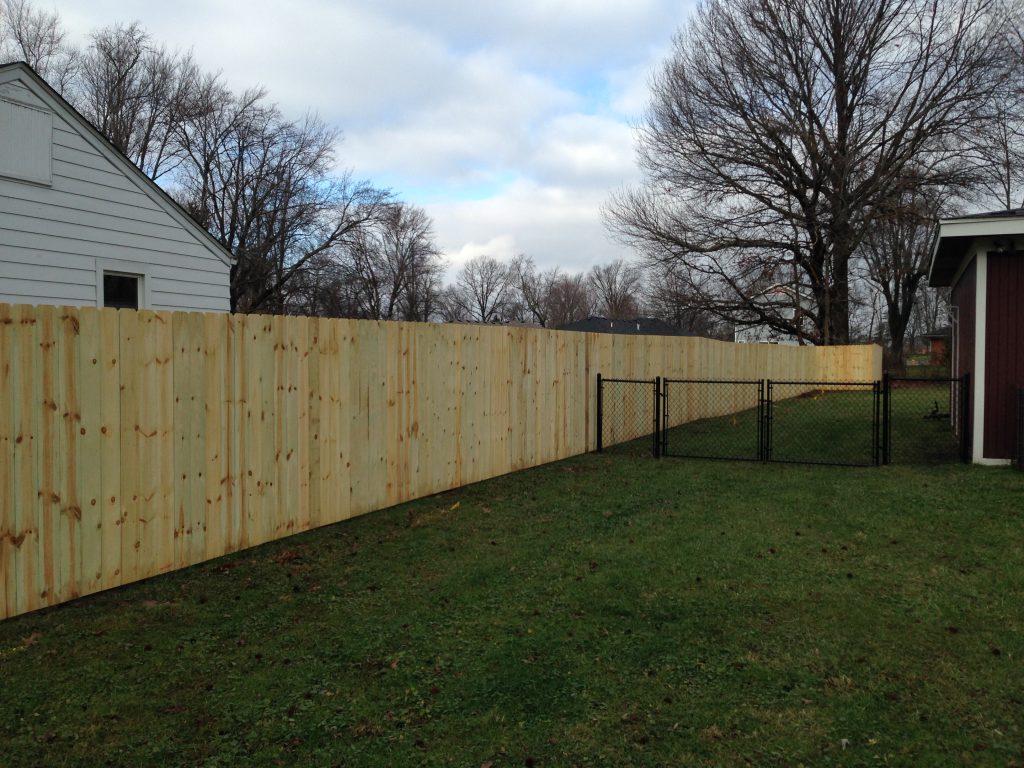 Treated Pine Dog Ear Privacy Fence and Black Chain Link Fence